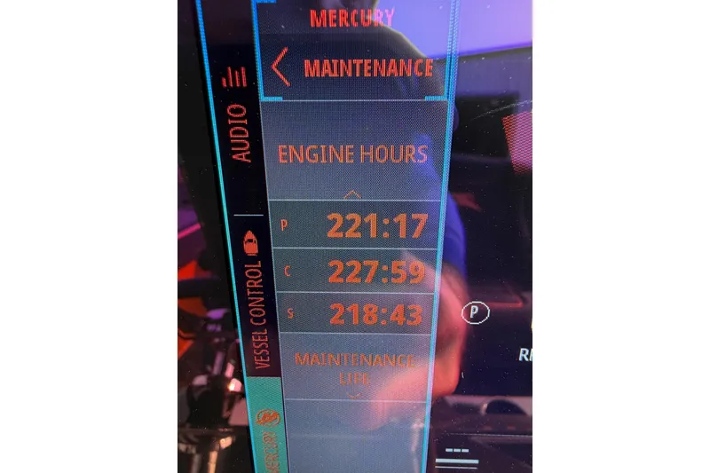 Slide: The Image of 2024 Donzi 39 VRZ engine hours display showing maintenance details. - 51
