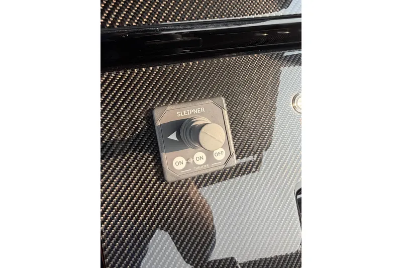 Slide: The Image of Control panel on 2024 Donzi 39 VRZ boat with Sleipner thruster switch. - 52