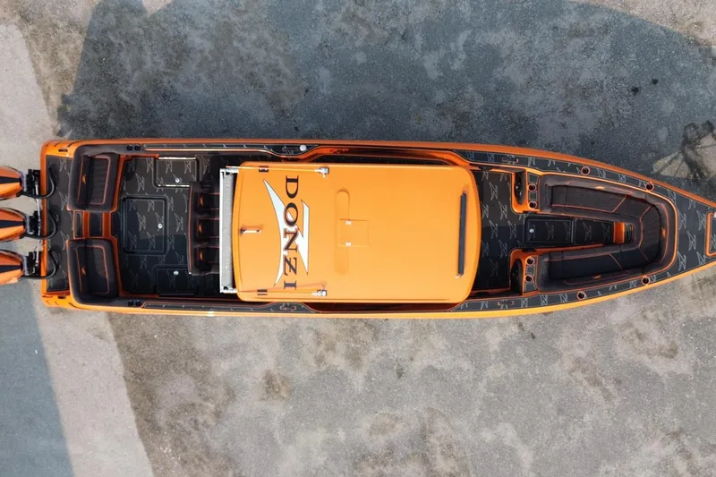 Slide: The Image of Top view of 2024 Donzi 39 VRZ boat with vibrant orange accents. - 67