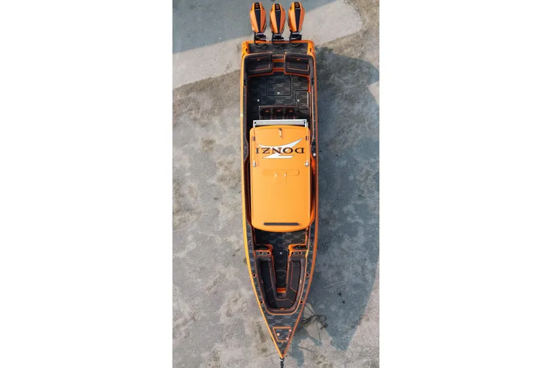 Slide: The Image of Top view of 2024 Donzi 39 VRZ boat in vibrant orange and black design. - 59