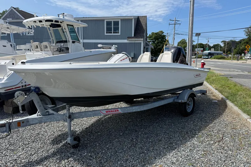 The Image of 2023 Boston Whaler 160 Super Sport boat on trailer, parked outdoors. - 0