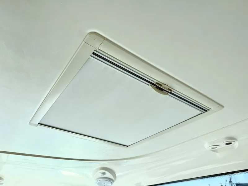 Slide: The Image of A skylight inside a 2006 Tiara Yachts 4300 Sovran. - 22