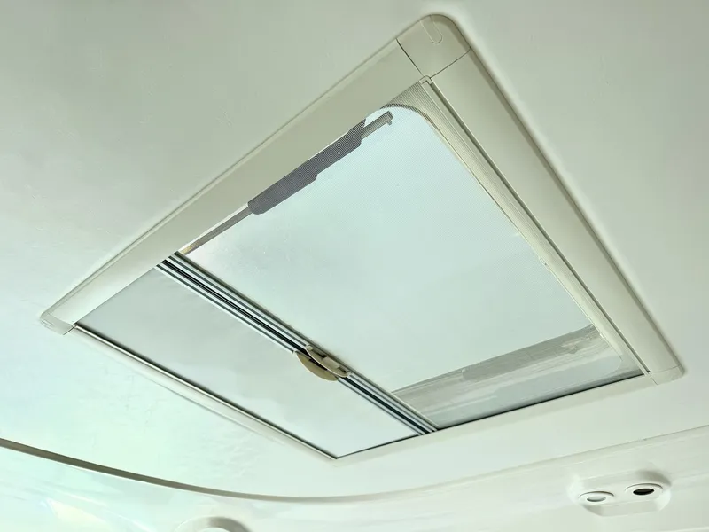 Slide: The Image of A skylight with a sliding screen in a boat. - 23