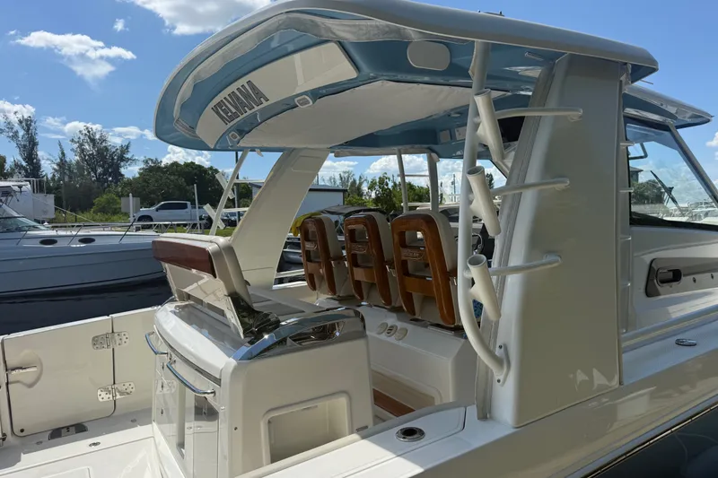 Slide: The Image of 2024 Boston Whaler 420 Outrage boat with sleek seating and modern design features. - 6