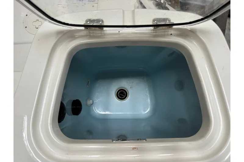 Slide: The Image of Livewell compartment on a 2024 Boston Whaler 420 Outrage boat. - 33