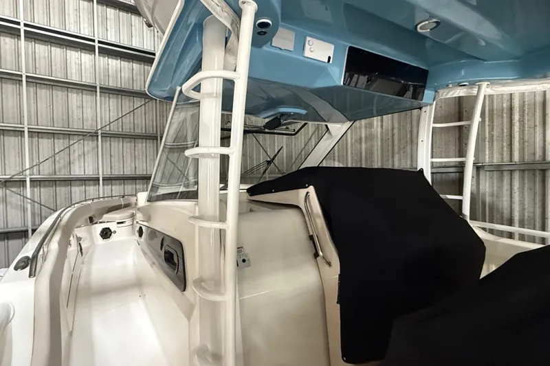 Slide: The Image of 2024 Boston Whaler 420 Outrage boat interior, featuring sleek design and modern amenities. - 17