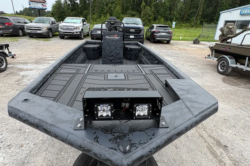 Slide: The Image of 2026 Gator Tail 1860 CC Extreme boat with rugged design, parked outdoors. - 4