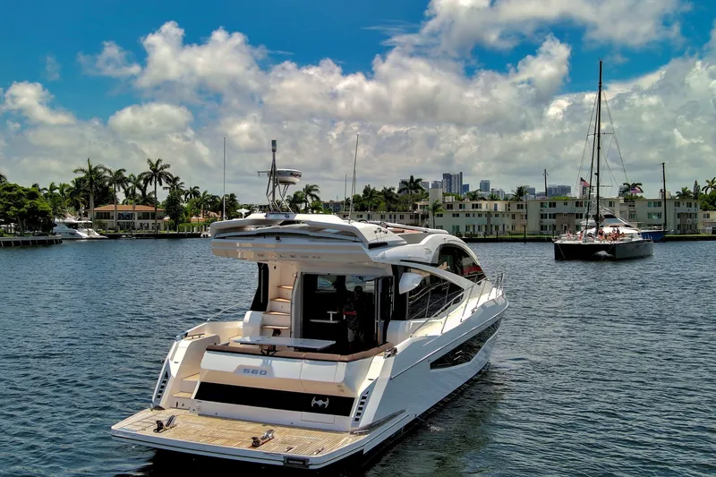 Slide: The Image of Luxury 2017 Galeon 560 Sky yacht cruising in scenic waterfront setting. - 2