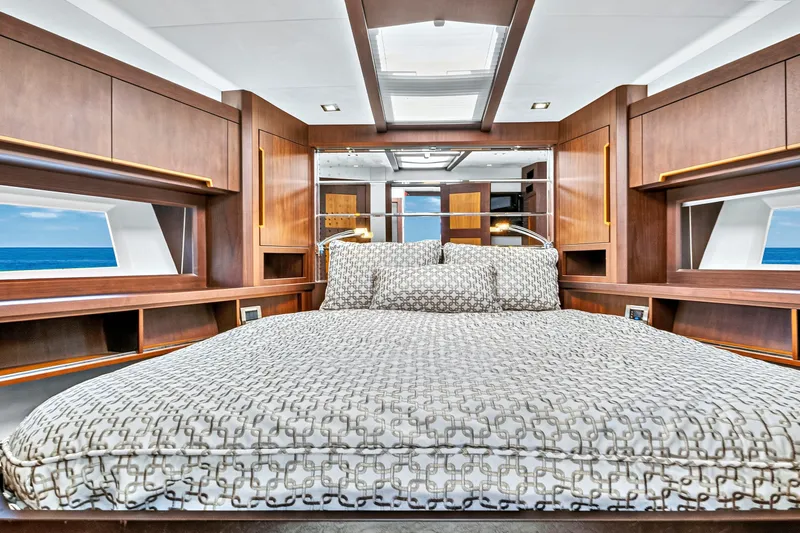 Slide: The Image of Luxurious bedroom interior of 2017 Galeon 560 Sky yacht with ocean view windows. - 26