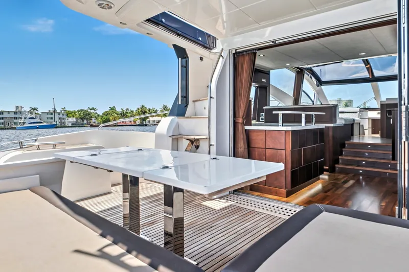 Slide: The Image of Luxurious 2017 Galeon 560 Sky yacht interior with sleek design and waterfront view. - 6