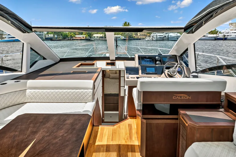 Slide: The Image of Luxurious interior of 2017 Galeon 560 Sky yacht with modern helm and seating. - 22