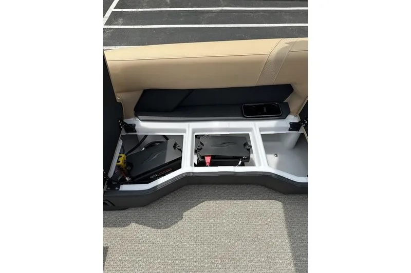 Slide: The Image of Open storage compartment in 2026 Evotti 723QL boat, showcasing organized interior space. - 9
