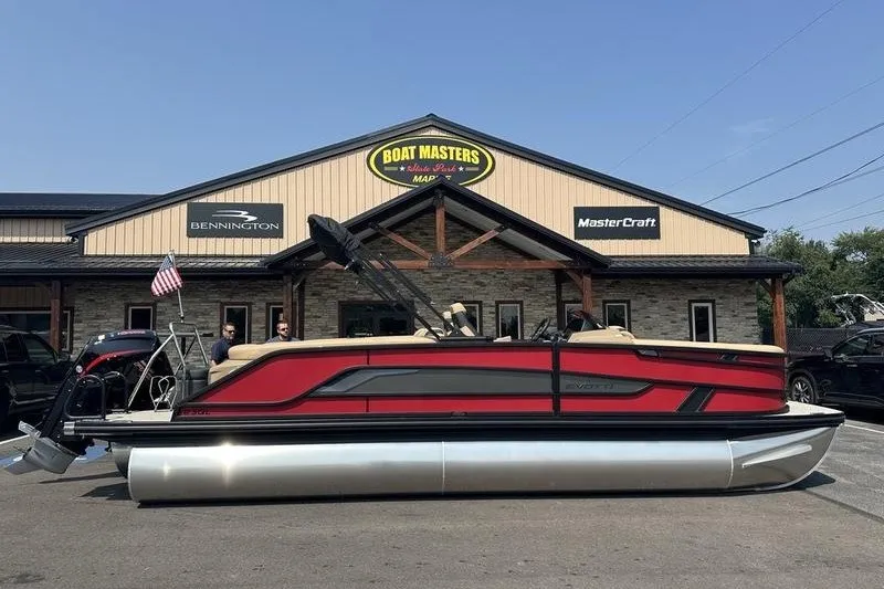 Slide: The Image of 2026 Evotti 723QL pontoon boat displayed at Boat Masters dealership. - 24