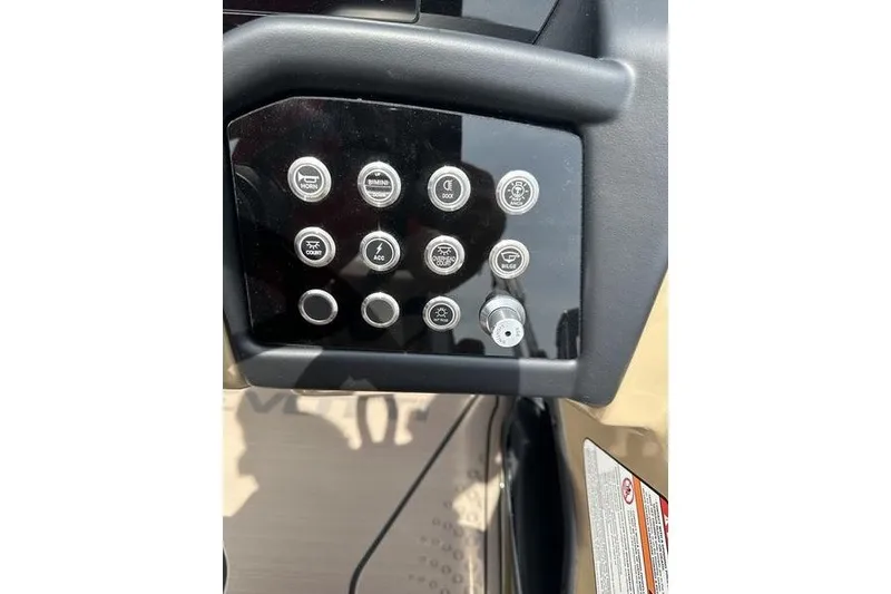 Slide: The Image of Control panel of 2026 Evotti 723QL with multiple buttons and switches. - 14
