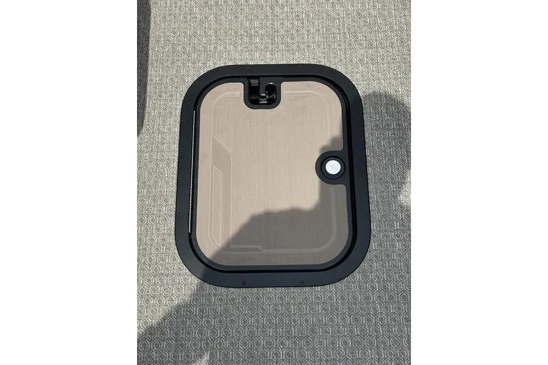 Slide: The Image of Evotti 723QL 2026 hatch on textured surface, featuring a sleek black frame. - 23