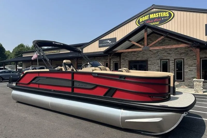 Slide: The Image of 2026 Evotti 723QL pontoon boat in front of Boat Masters Marine store. - 27