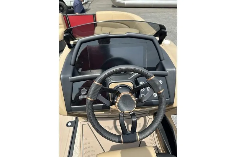 Slide: The Image of Steering console of 2026 Evotti 723QL boat with modern dashboard and controls. - 5