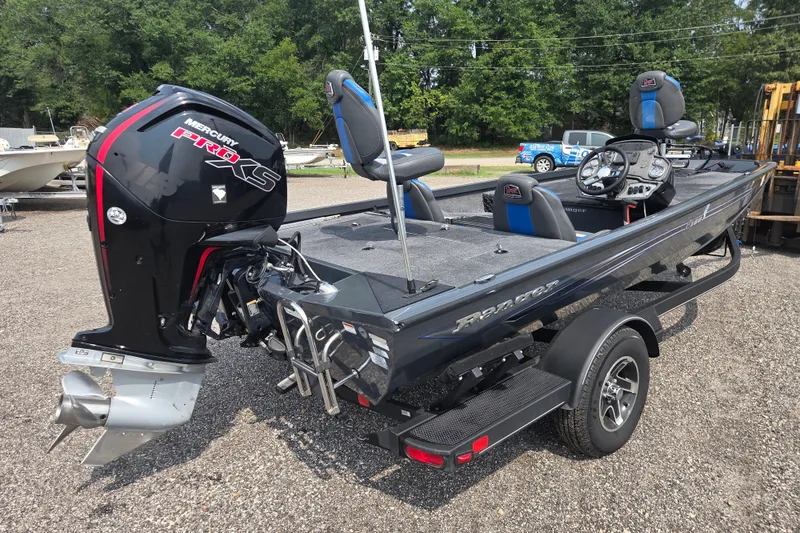 Slide: The Image of 2022 Ranger RT188 boat with Mercury Pro XS engine, parked outdoors. - 5