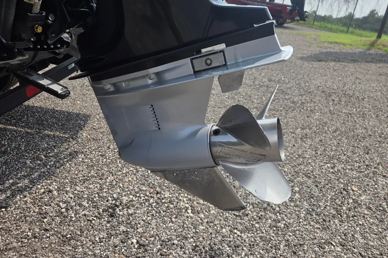 Slide: The Image of 2022 Ranger RT188 boat propeller on gravel surface, showcasing Mercury Marine branding. - 8