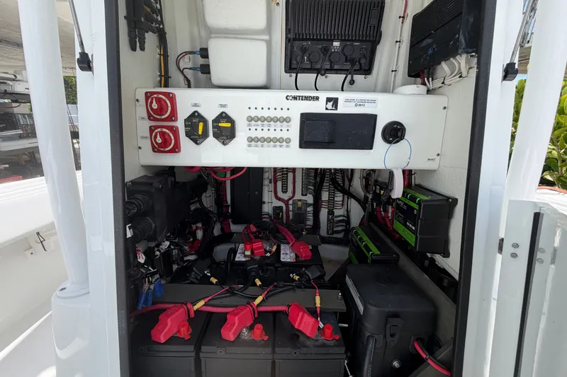 Slide: The Image of Electrical panel and battery setup in 2024 Contender 25 Bay boat. - 43