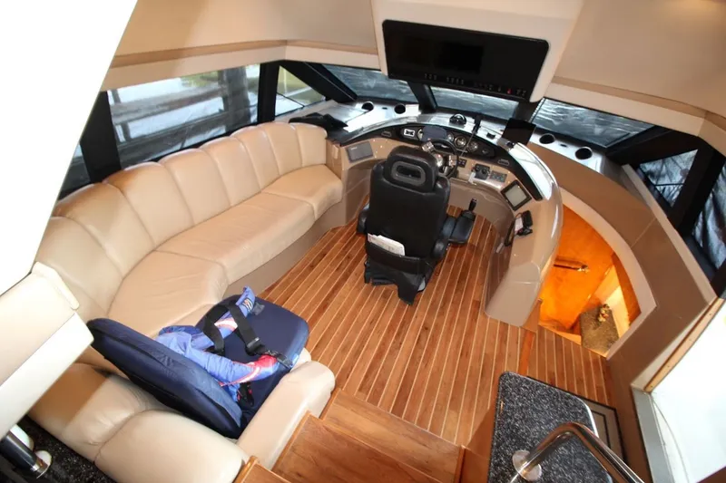 Slide: The Image of Pilothouse interior of 2000 Carver 530 Voyager with leather seating and modern controls. - 23