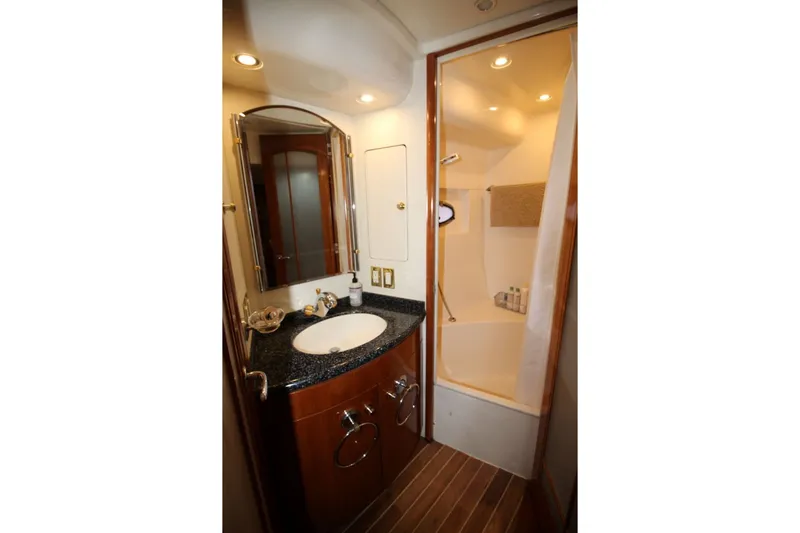 Slide: The Image of Luxurious bathroom in 2000 Carver 530 Voyager Pilothouse yacht with elegant fixtures. - 34