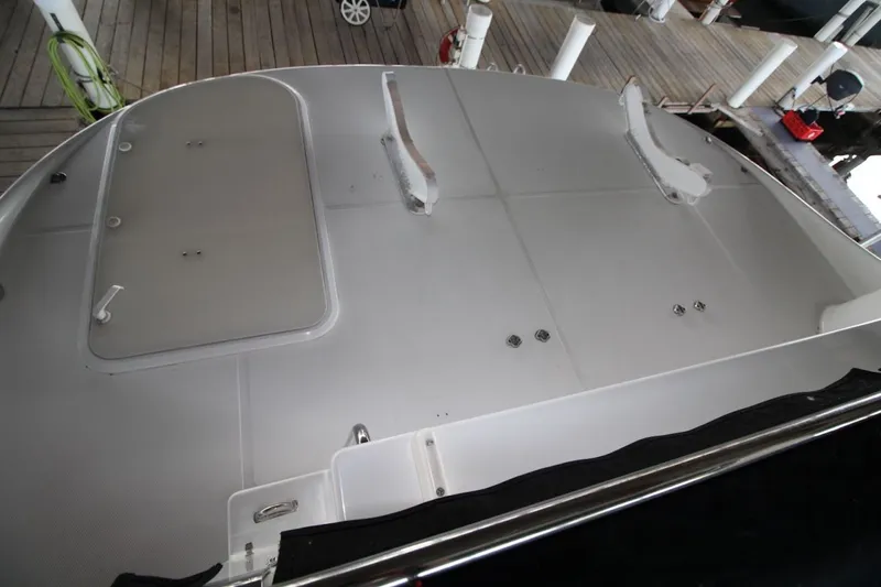 Slide: The Image of 2000 Carver 530 Voyager Pilothouse deck view at dockside. - 13