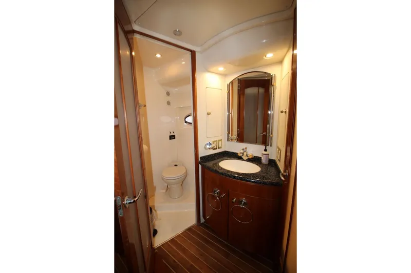 Slide: The Image of Luxurious bathroom in 2000 Carver 530 Voyager Pilothouse yacht with elegant fixtures. - 33