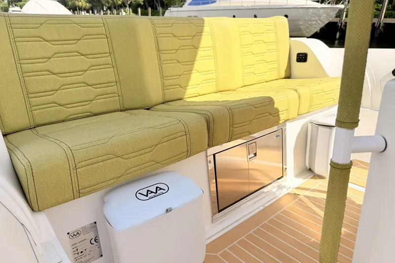 Slide: The Image of Luxurious seating on 2027 Aqvaboats Luxrib 25 with modern design and integrated storage. - 27