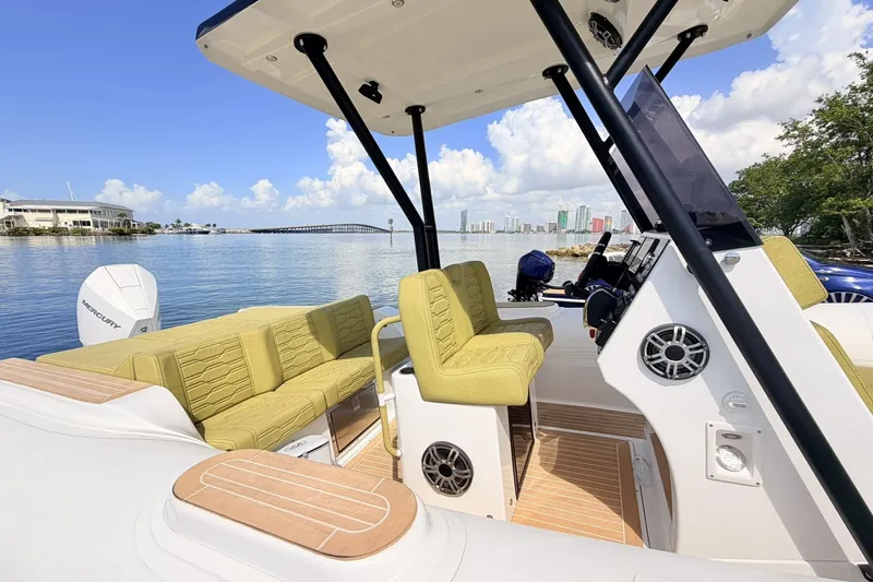 Slide: The Image of Luxurious 2027 Aqvaboats Luxrib 25 interior with stylish seating, overlooking serene waterfront views. - 28