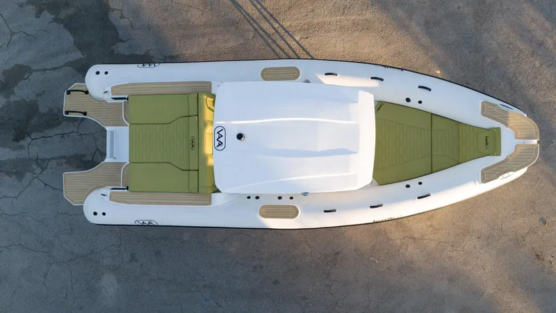Slide: The Image of Aerial view of 2025 Aqvaboats Luxrib 25, featuring sleek design and spacious deck. - 14