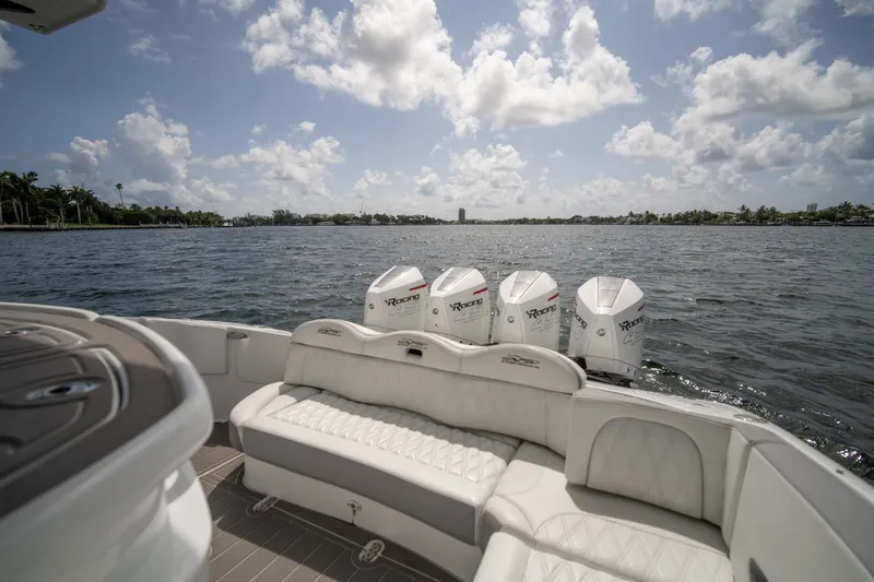 Slide: The Image of Luxury MTI V42 boat with quad engines on a sunny day, 2020 model. - 11