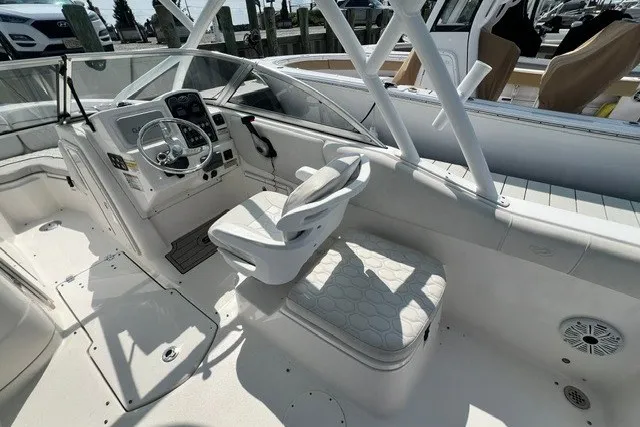 Slide: The Image of 2020 Sea Fox 226 Traveler boat interior with helm, seating, and controls. - 4