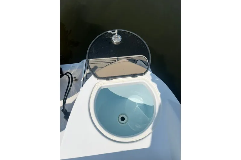 Slide: The Image of Livewell on a 2020 Sea Fox 226 Traveler boat, open lid, showing interior. - 12