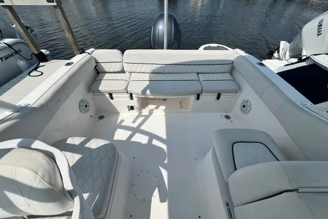 Slide: The Image of 2020 Sea Fox 226 Traveler boat interior with cushioned seating and Yamaha engine. - 13