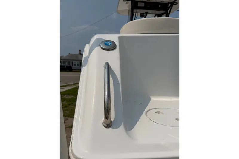 Slide: The Image of 2024 Sea Hunt Ultra 275 SE boat detail with stainless steel handle and button. - 20