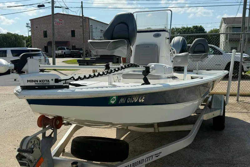 Slide: The Image of 2021 Avid 19 FS boat on trailer with Minn Kota PowerDrive motor. - 3