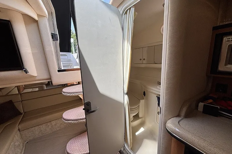 Slide: The Image of Interior of 2006 Sea Ray 340 Sundancer showing cabin and bathroom area. - 32