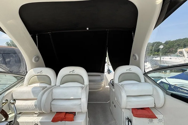 Slide: The Image of Interior view of a 2006 Sea Ray 340 Sundancer yacht with plush seating. - 17