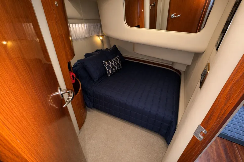 Slide: The Image of Luxurious cabin interior of 2001 Sea Ray 450 Express Bridge yacht. - 26