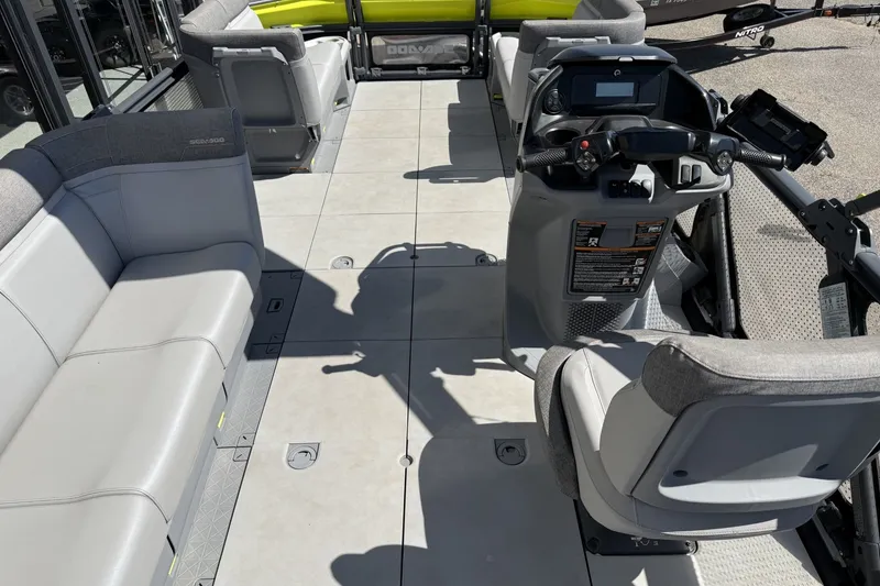 Slide: The Image of 2024 Sea-Doo Switch Cruise 21 interior with spacious seating and modern dashboard controls. - 3