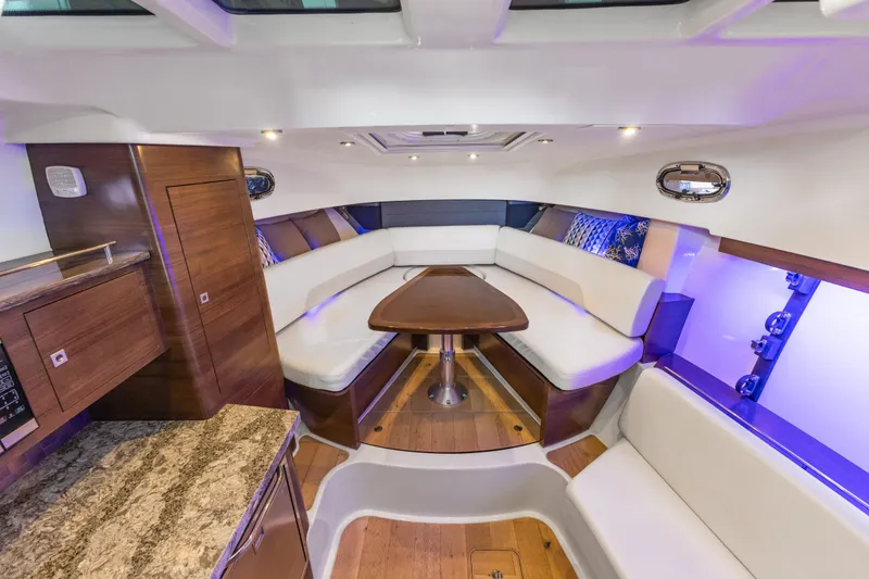 Slide: The Image of Luxurious interior of 2018 Boston Whaler 345 Conquest with elegant seating and ambient lighting. - 43