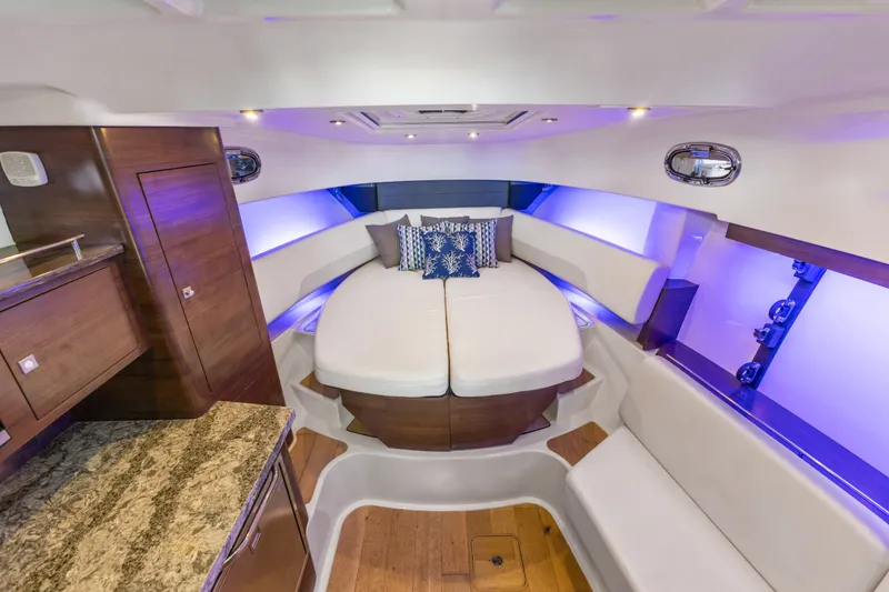Slide: The Image of Luxurious interior of 2018 Boston Whaler 345 Conquest with elegant seating and ambient lighting. - 44