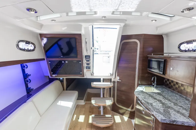 Slide: The Image of Luxurious interior of 2018 Boston Whaler 345 Conquest with modern amenities and sleek design. - 39