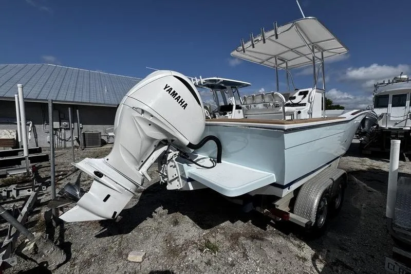 Slide: The Image of 1982 Grady-White Tournament 22 boat with Yamaha outboard motor on trailer. - 5
