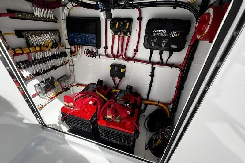 Slide: The Image of Electrical system of a 1982 Grady-White Tournament 22 boat with batteries and wiring. - 26