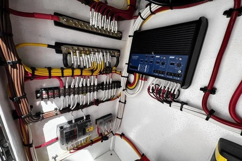 Slide: The Image of Electrical wiring and components inside a 1982 Grady-White Tournament 22 boat. - 27