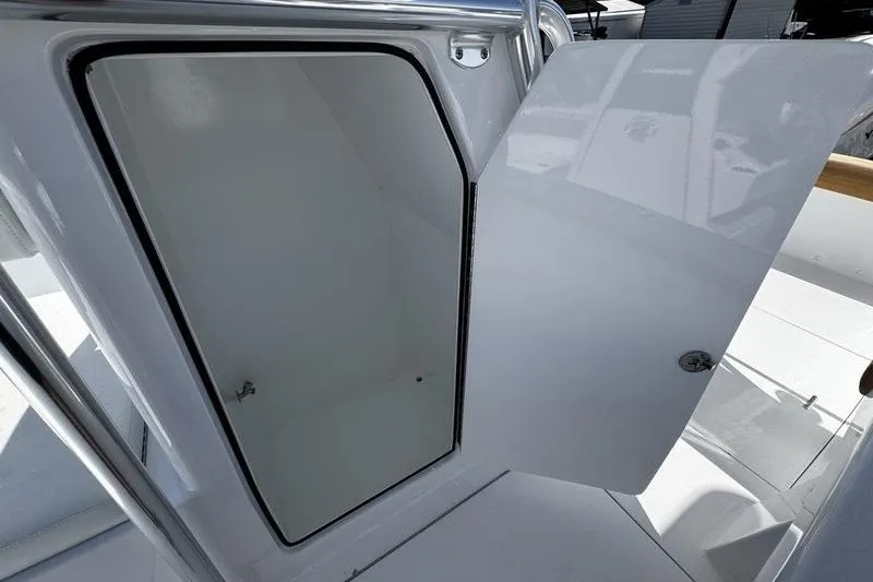 Slide: The Image of Open storage compartment on a 1982 Grady-White Tournament 22 boat. - 19