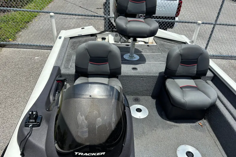Slide: The Image of 2023 TRACKER MARINE Pro Team 175 TF boat interior with seating and control panel. - 6