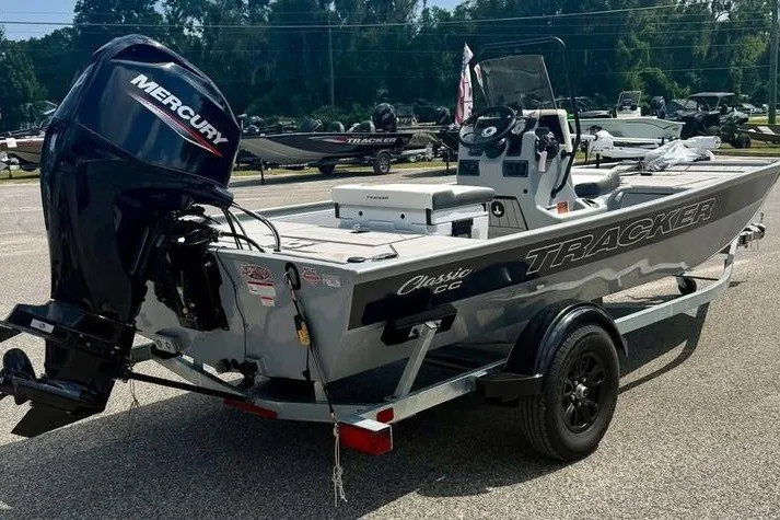 Slide: The Image of 2027 Tracker Bass Tracker Classic CC boat with Mercury engine on trailer. - 7
